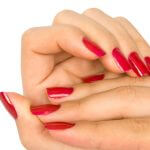 Ladies hands with Red Nail Polish